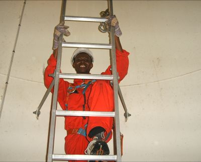 Training paticipant Tony climbing a »windkraft anlage« in Germany.